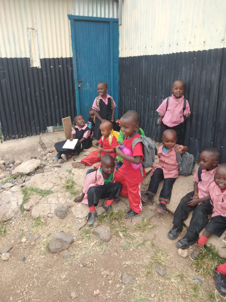 Young male students outside school