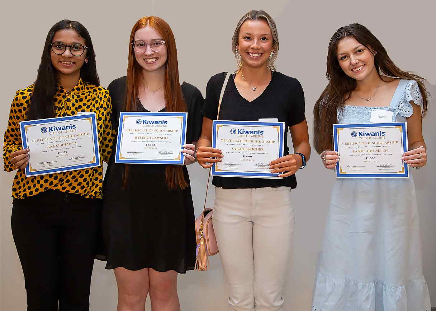four female teen scholarship winners