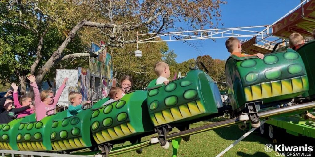 Kids ride the rollercoaster at Apple Festival 2022