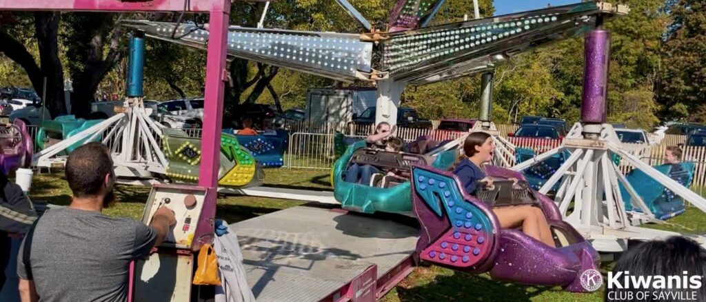 Kids ride the rides at Apple Festival 2022