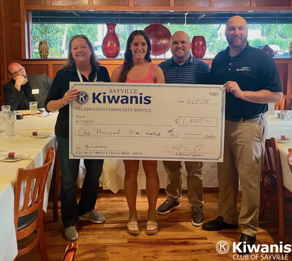 L to R: Lt. Governor Jarrod Gordon (rear), Dr. Alesia Olsen, Anna Meserve, Treasurer Al Linsdey and President Steve Blody