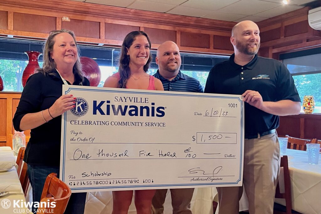 L to R: Dr. Alesia Olsen, Anna Meserve, Treasurer Al Linsdey and President Steve Blody