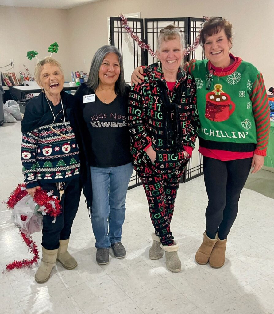 Prudence, Martha Hense, Dee Rochin and Courtney Hengst working at Toys for Joy, Dec 2023