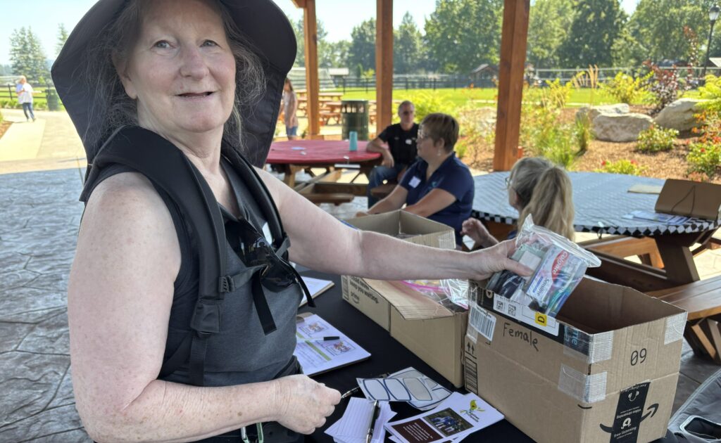 Kiwanis Club of CdA distributes hygiene kits to Relatives as Parents at their picnic on Aug 24, 2026.
