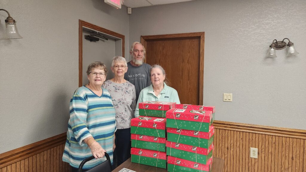 Pam Nowak, DeeAnn Matheson, Steven Burns & Margie Ryan-Cheney helped pack 15 shoe boxes for Operation Christmas Child at the Nov 14 meeting