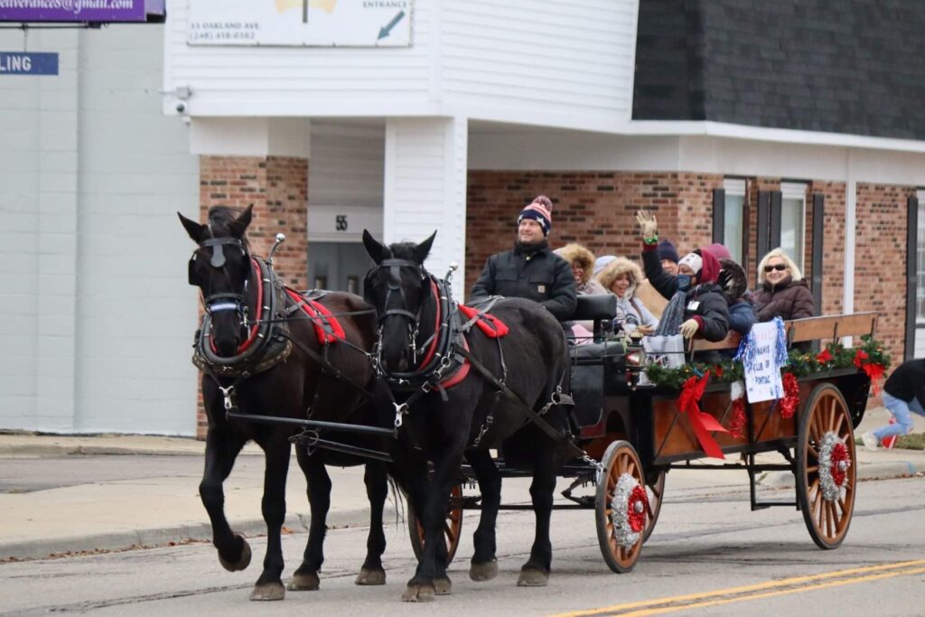 Kiwanis Club members from Pontiac and South Oakland in the Holiday Extravaganza in Downtown Pontiac. 