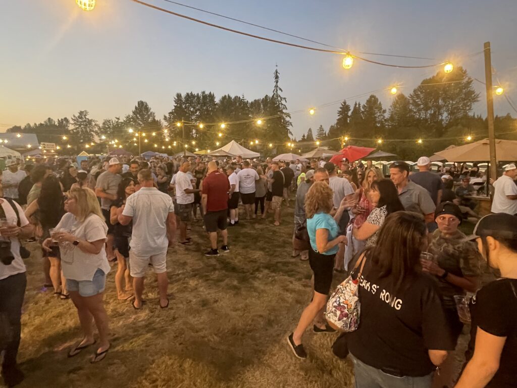 showing patrons dancing at the 2023 Aquafest Kiwanis Beer Garden
