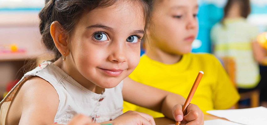 This young student in school is an example of kids Tecumseh Kiwanis club helps.