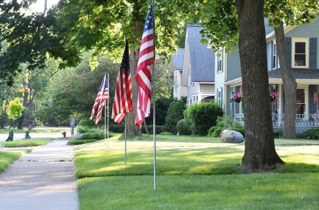 American flags line a Tecumseh street