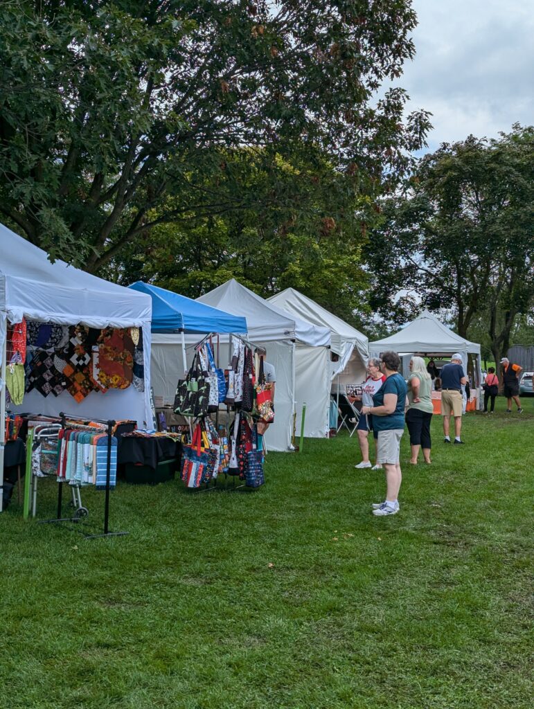 2026 is the 17th installment of what has become one of the most successful art fairs in Mid-Michigan. Patrons can expect the finest arts and crafts, local food, and engaging children's activities while enjoying the many comforts, joys, and experiences of Swartz Creek's beautiful Elms Park. 