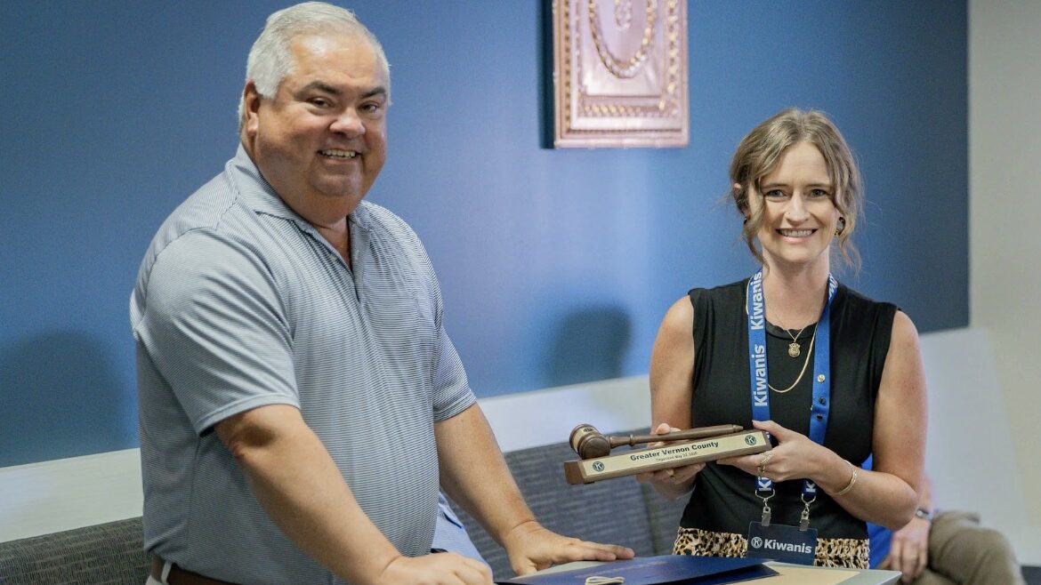 Kiwanis President receives gavel from Kiwanis official Governor