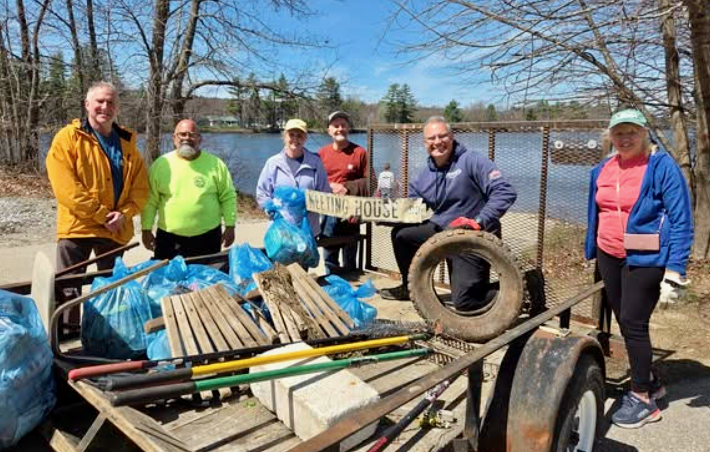 Volunteers with blue cleanup bags collected along Hooksett roadsides during Beautify Hooksett Day 2026