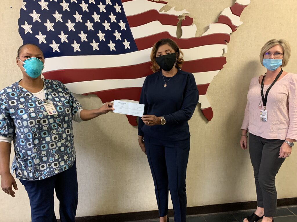 presenting check to war veterans home