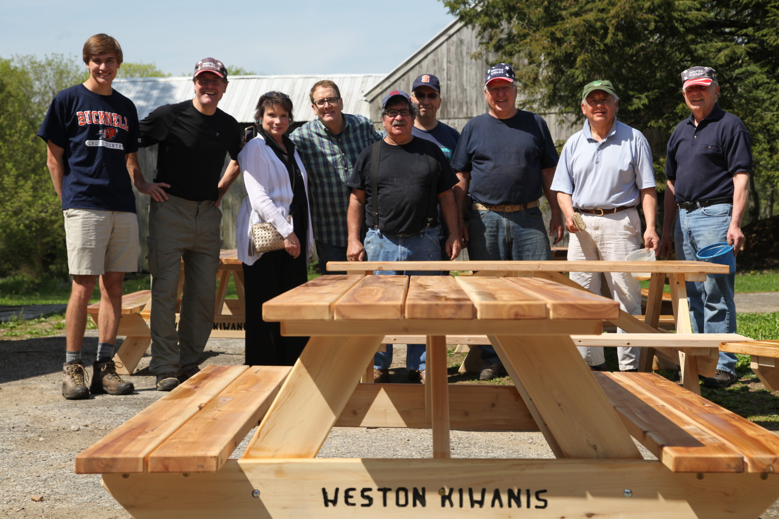 Kiwanis members with newly constructed picnic table.