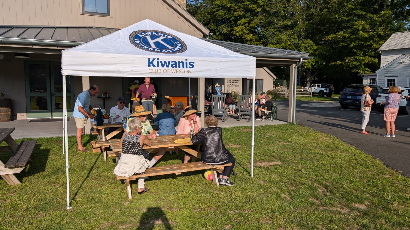 Membership Committee Co-chair Juan Negroni welcomed members and guests at the Kiwanis tent.