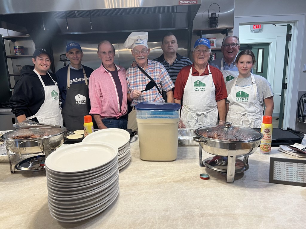 Kiwanis workers in Lachat Town Farm kitchen.