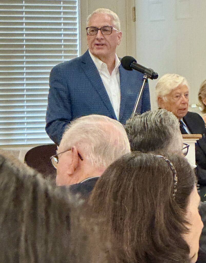 Harry Spencer addressing the attendees at Tom Glass's celebration of life.