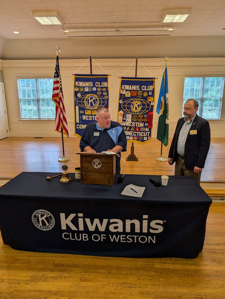 Patrick Tokarz inducting Tom Watson as president.