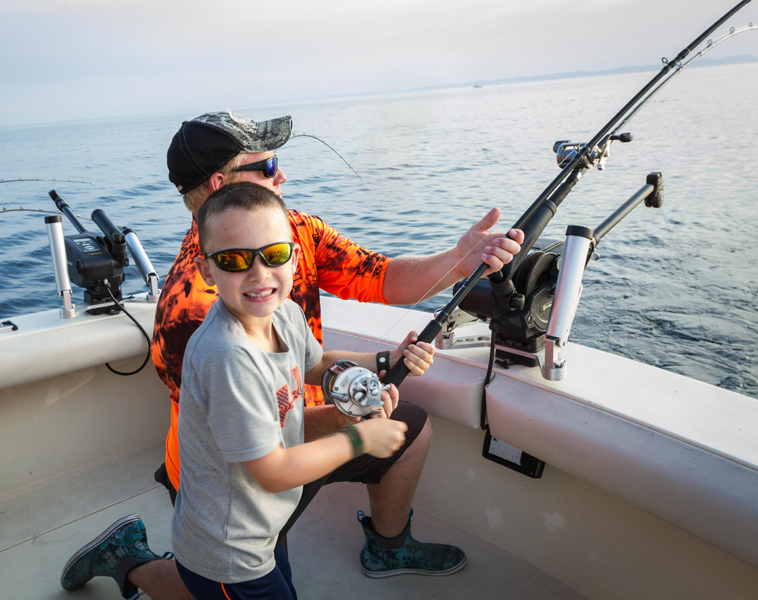 Youth fishing on Lake Michigan