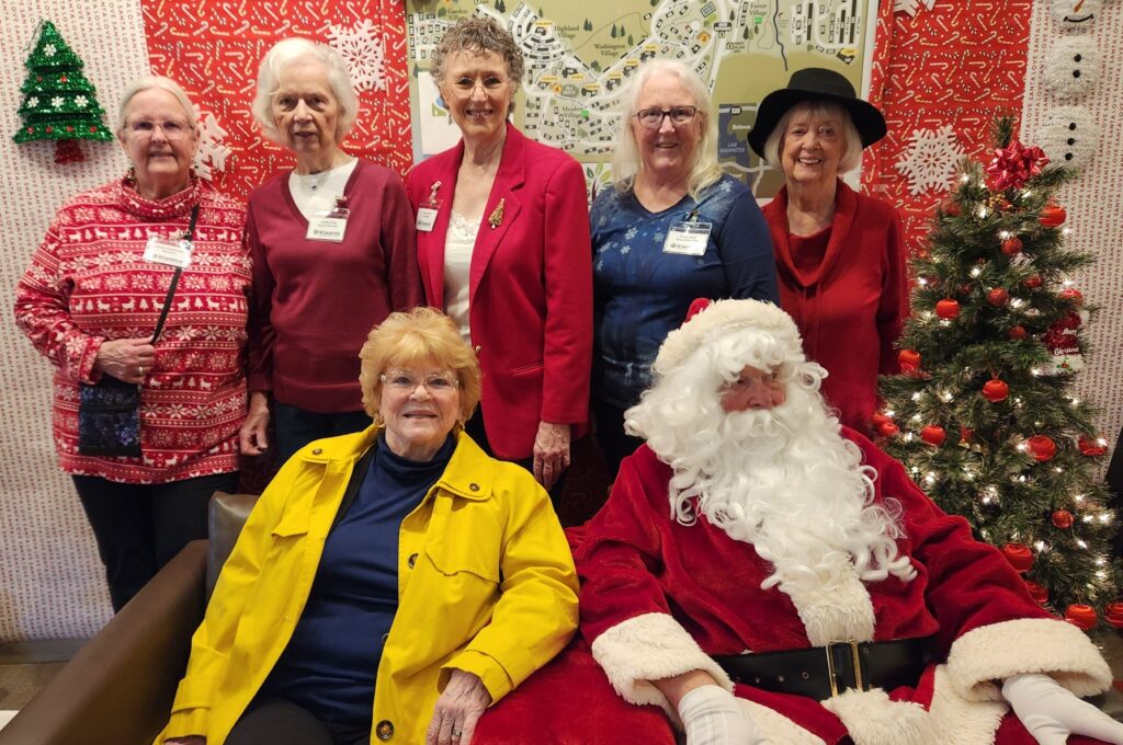 Kiwanis helpers with Santa at 2024 Tree Lighting event.