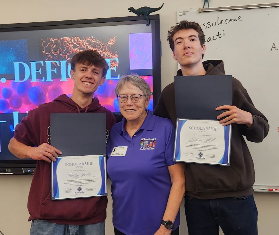 Finn Bullis and Tristan Abell with AJK Club Advisor Leslie Feuerborn